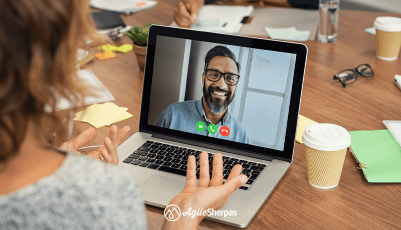 Video call between two remote agile marketing team members 